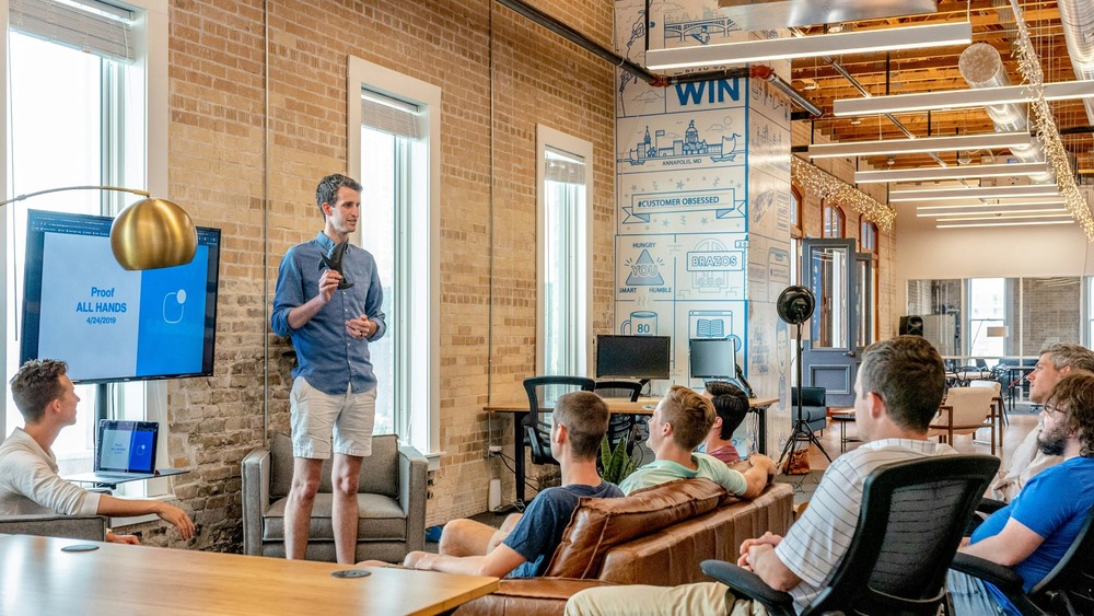 Man giving presentation to his colleagues